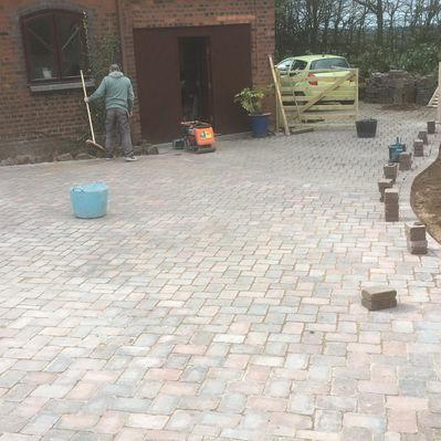 Our team finishing off a block paving task